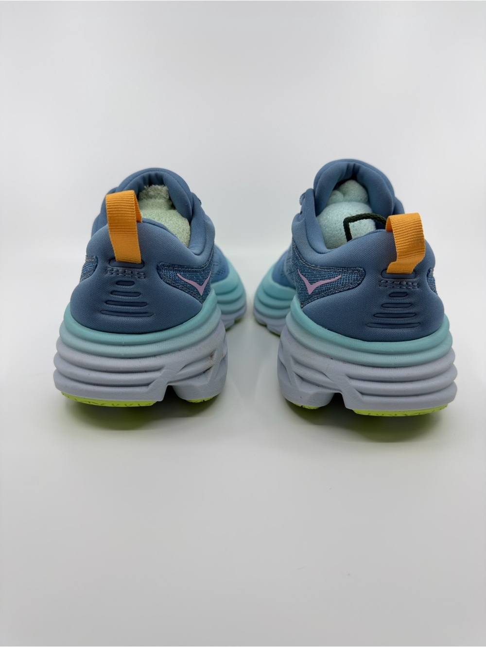 Hoka Women's Bondi 8 Shadow/Dusk blue colorway with pink and lime green details. - Picture 3 of 9